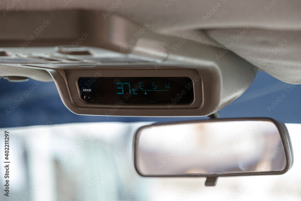 car mirror in which you can see the outside temperature which is hot car mirror in which you can see the outside temperature which is hot