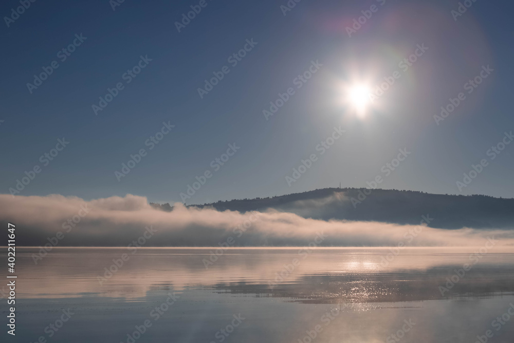 Morning mist over the lake. Vlasina lake, Eastern Serbia