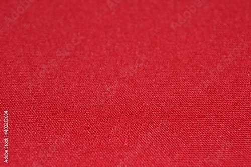 close view of a red neoprene fabric photo