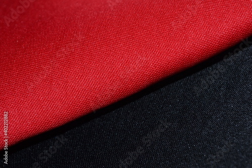close-up view of red and black neoprene fabrics