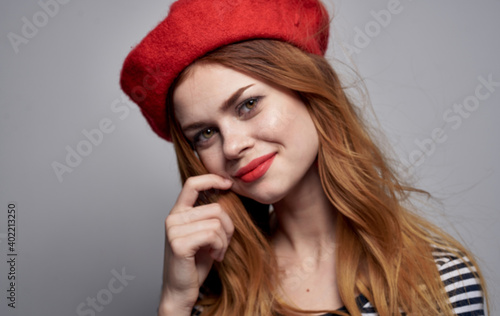 Romantic woman with bright makeup red earrings headdress portrait model