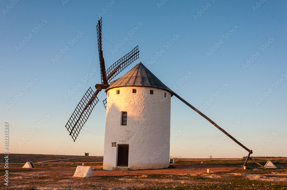 Windmill at sunset in Campo de Criptana, Ciudad Real, Spain Windmill at sunset in Campo de Criptana, Ciudad Real, Spain