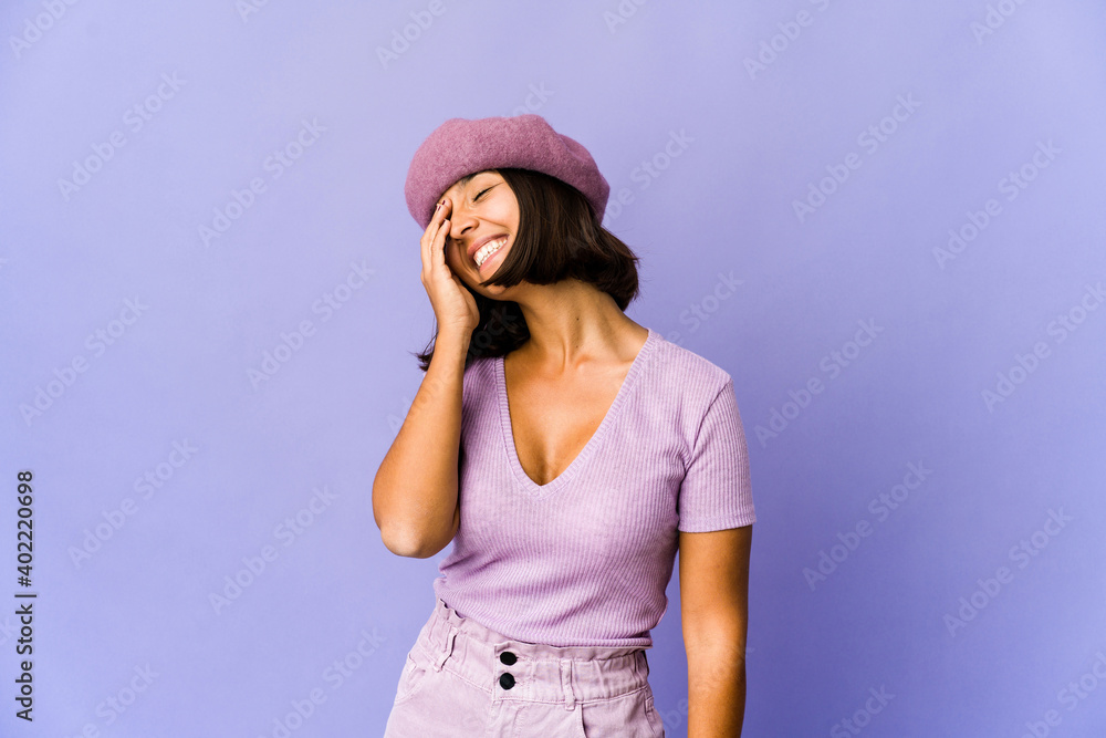 Young mixed race woman laughing happy, carefree, natural emotion. Young mixed race woman laughing happy, carefree, natural emotion.