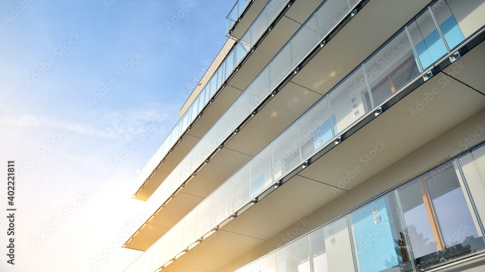 Apartment residential house and home facade architecture and outdoor facilities. Blue sky on the background. Sunlight Apartment residential house and home facade architecture and outdoor facilities. Blue sky on the background. Sunlight