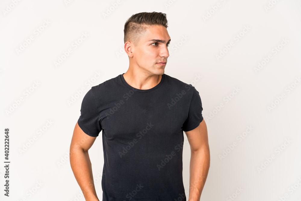 Obraz premium Young caucasian handsome man isolated confused, feels doubtful and unsure.