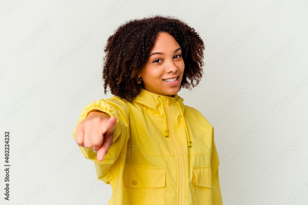 Young african american mixed race woman isolated cheerful smiles pointing to front. Young african american mixed race woman isolated cheerful smiles pointing to front.