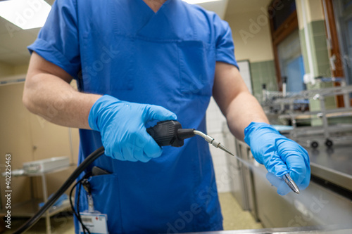 Foto in a sterilization department of the hospital, surgical instruments are pre-clea