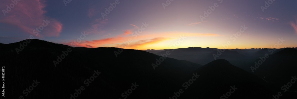 Stunning aerial mountain top sunrise