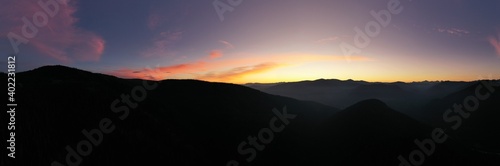 Stunning aerial mountain top sunrise