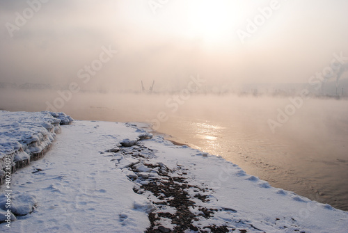 The Yenisei river in a pink fog © Evangelina
