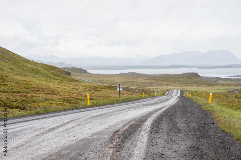 muddy gravel road on the icelandic countryside of Snaefellsnes