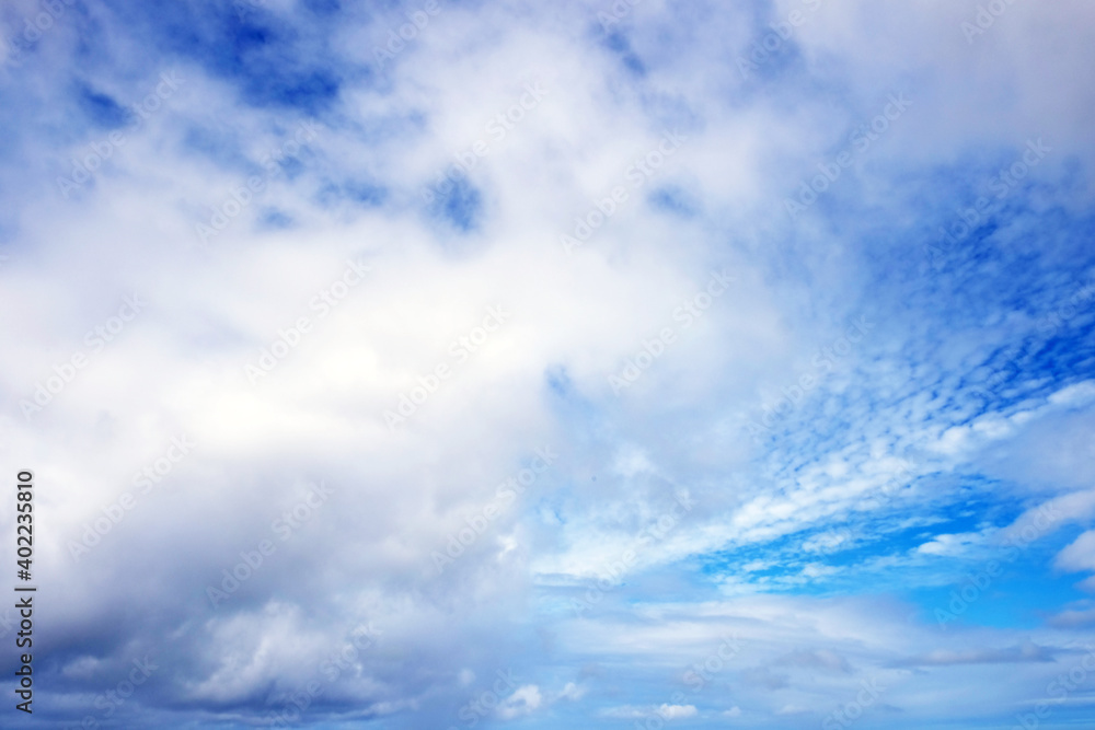 View from the coast of the Easter Island, of blue sky covered by white clouds, over the Pacific Ocean. View from the coast of the Easter Island, of blue sky covered by white clouds, over the Pacific Ocean.