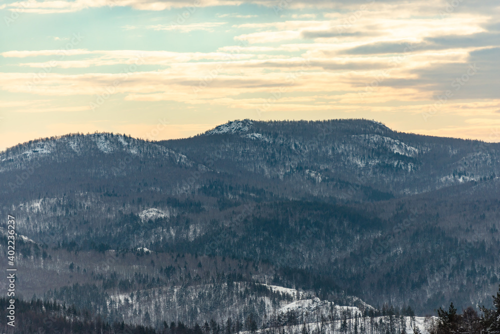 Mountains and forests in the Urals. Endless expanses of winter mountains. Mountains and forests in the Urals. Endless expanses of winter mountains.