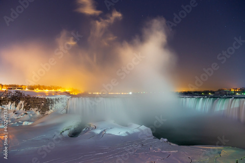 Vapour rises over Ontario's Niagara Falls after a wintery snowfall