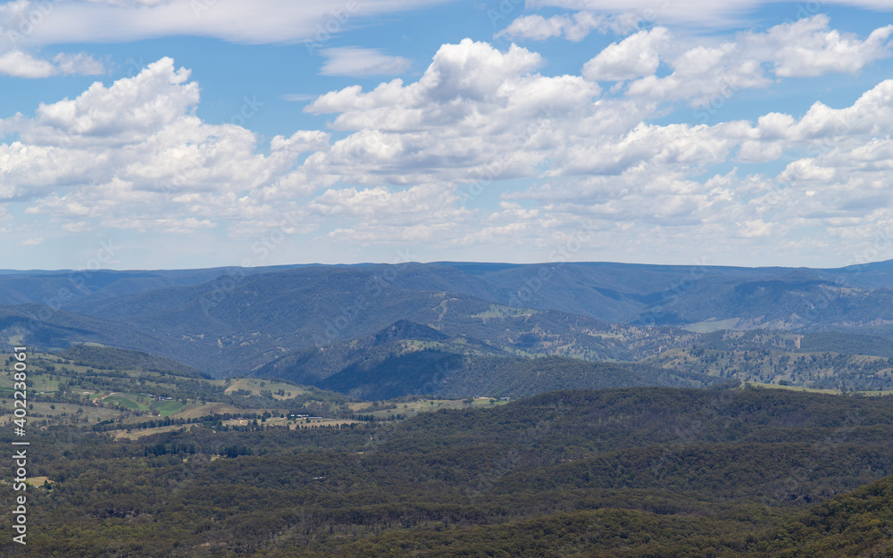 Layer of mountains in the distance.