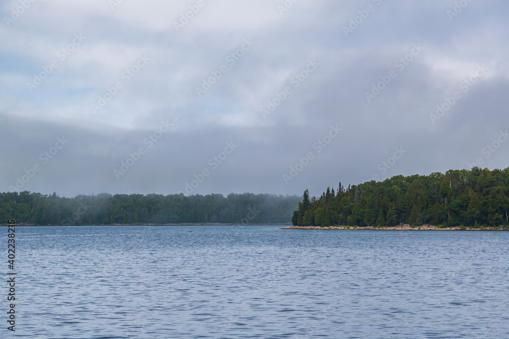 Landscape photo of Flowerpot Island on a foggy day