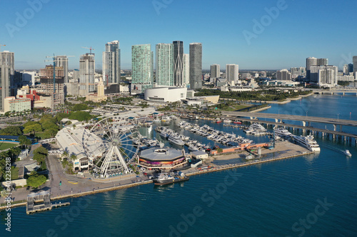 Miami, Florida - December 27, 2020 - Aerial view of Bayside Marketplace, City of Miami Marina and Miami skyline on sunny winter morning. © Francisco