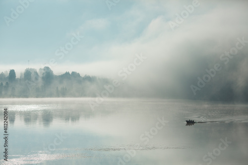 Fog on the river and a boat.