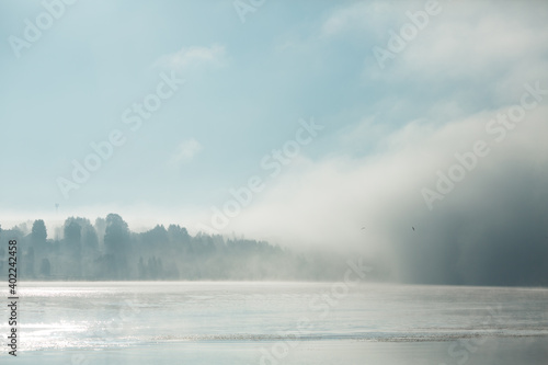 Thick fog in the morning on the river. © vov8000
