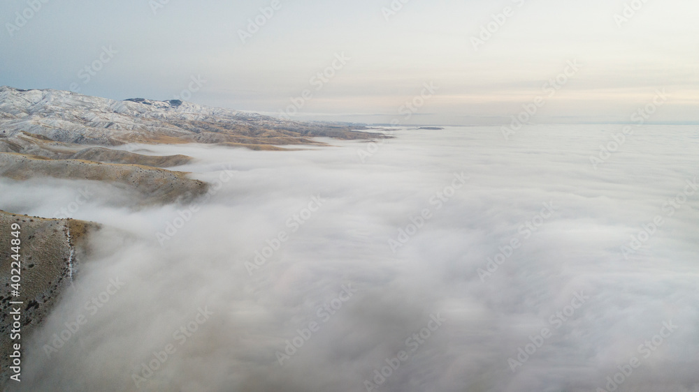 clouds covering the valley floor during winter