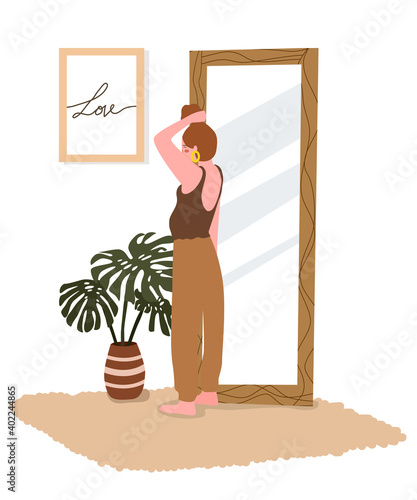 self love concept women standing front mirror styling hair with flat style
