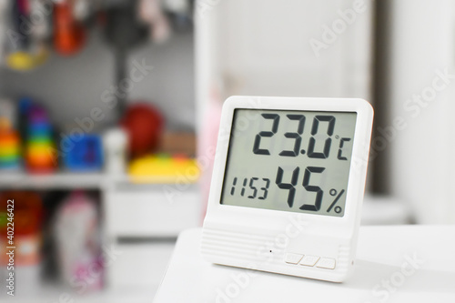 Digital clock, thermometer and  hygrometer for nursery or children room. 