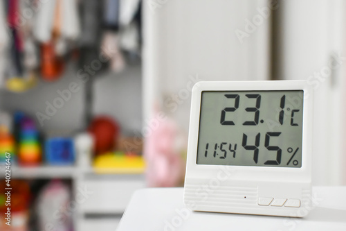 Foto Digital clock, thermometer and  hygrometer for nursery or children room