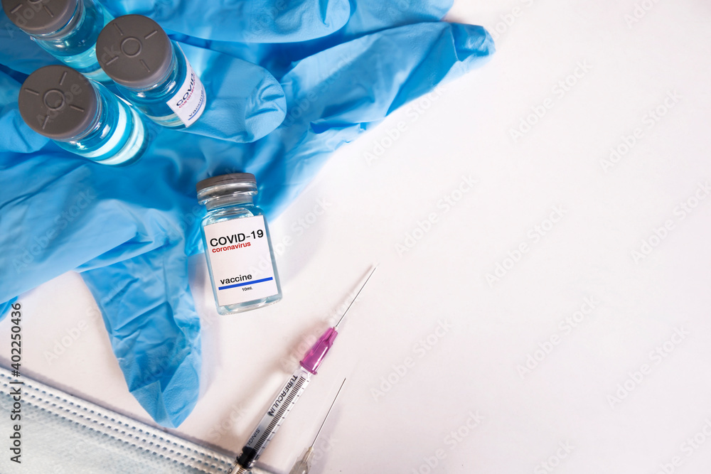Top view,Coronavirus Covid-19 vaccine medical gloves and copy space ,medicine concept. Top view,Coronavirus Covid-19 vaccine medical gloves and copy space ,medicine concept.