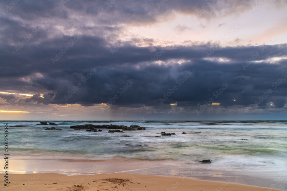 Moody morning bay seascape with rain clouds and rocks Moody morning bay seascape with rain clouds and rocks