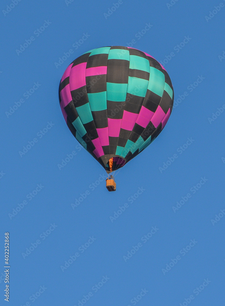 Peaceful flight over sunny Arizona in a brightly colored Hot Air Balloon. Maricopa County, Arizona Peaceful flight over sunny Arizona in a brightly colored Hot Air Balloon. Maricopa County, Arizona