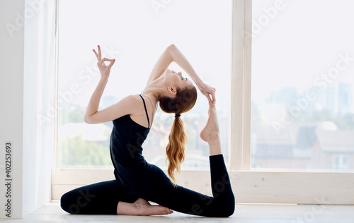 woman yoga asana room balance window morning exercise