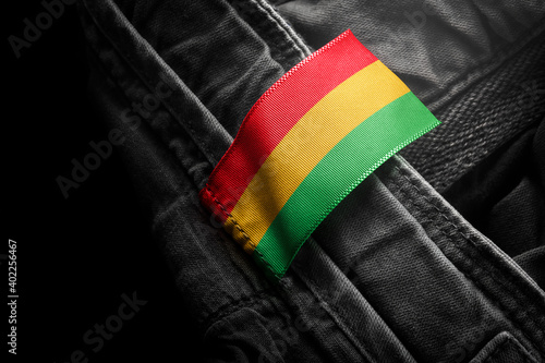Tag on dark clothing in the form of the flag of the Bolivia