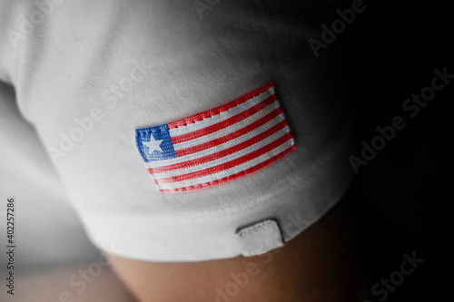 Patch of the national flag of the Liberia on a white t-shirt