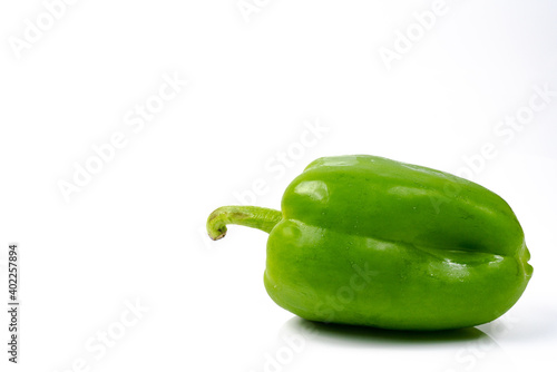 Green peppers on a white background