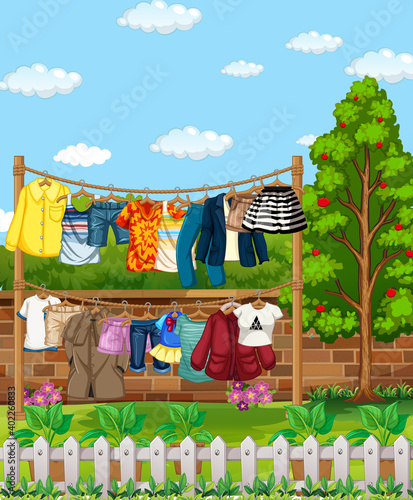 Fototapeta Naklejka Na Ścianę i Meble -  Many clothes hanging on a line outside the house scene