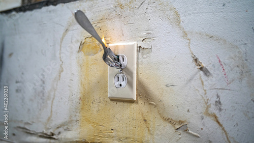 Fork In Electrical Outlet