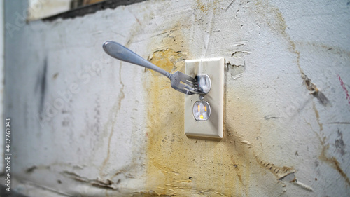 Fork In Electrical Outlet