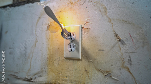 Fork In Electrical Outlet