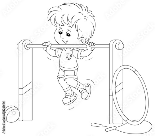 Cheerful little boy pulling...