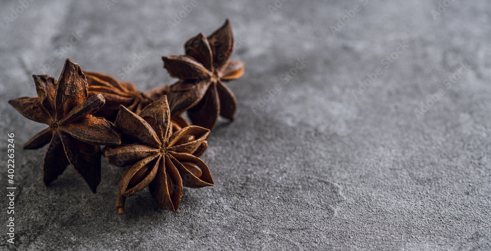 Anise stars on the rustic background. Background and textures. 
