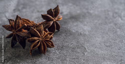 Anise stars on the rustic background. Background and textures. 