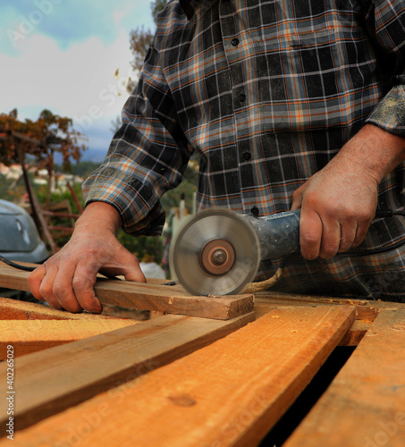 carpenter cutting wood