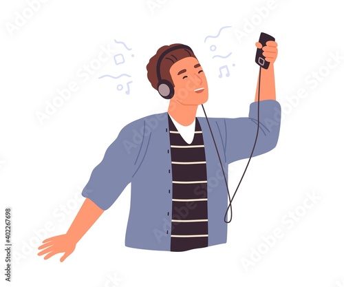 Cute male teenager in headphones listening to music using smartphone or mp3 player vector flat illustration. Happy dancing young man enjoying sound with modern device isolated on white