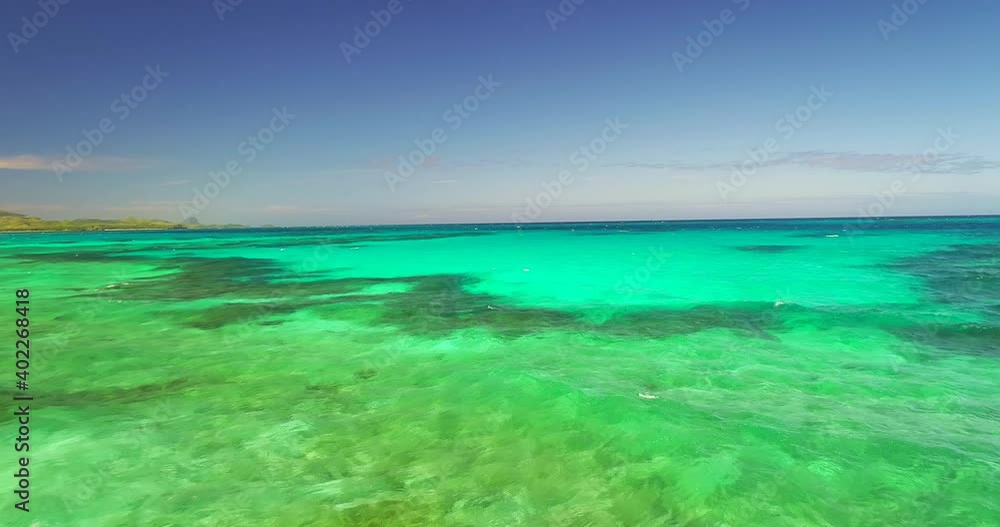 View of Colorful, Tropical Ocean Waves View of Colorful, Tropical Ocean Waves