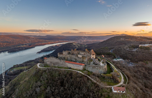 Hungary - The historical Visegrad Castle near Danube river from drone view at sunrise