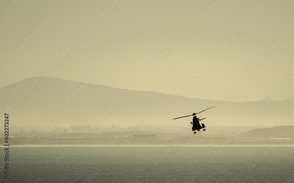 Fototapeta premium Helicopter at sea for Navy training exercises