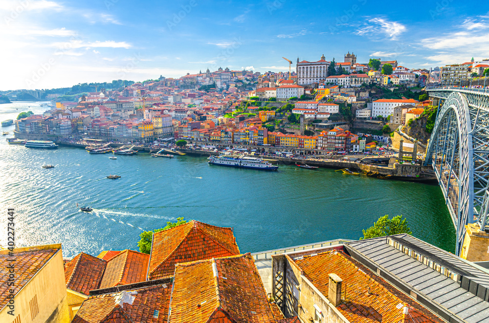 Aerial panoramic view of Porto Oporto city historical centre with Ribeira district colorful buildings houses on embankment of Douro River and Ponte Dom Luis I Bridge, Norte or Northern Portugal - obrazy, fototapety, plakaty 