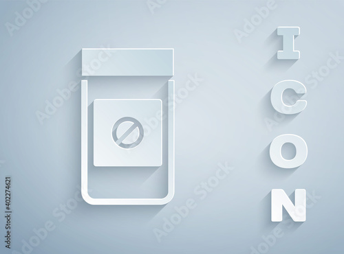 Paper cut Sports doping, anabolic drugs icon isolated on grey background. Anabolic steroids tablet. Pills in jar. Paper art style. Vector.