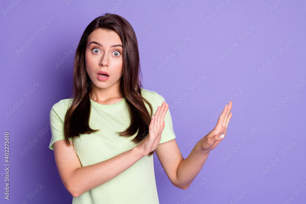 Photo portrait of nervous girl prohibiting rejecting disagree staring isolated on vivid violet color background with empty space Photo portrait of nervous girl prohibiting rejecting disagree staring isolated on vivid violet color background with empty space