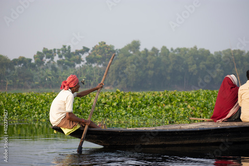 a ferryman of majhi in bengali of west bengal in action photo